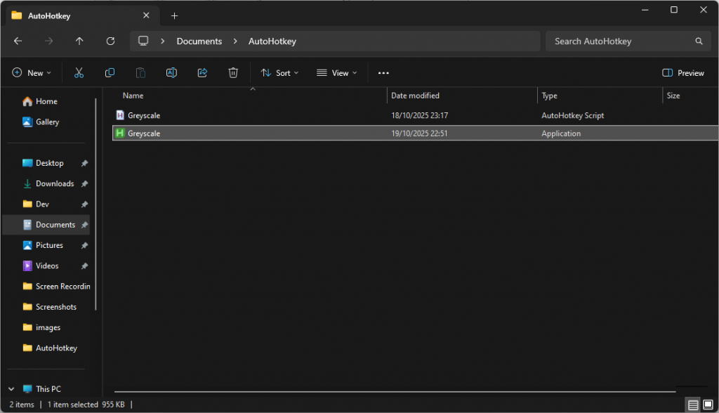 Windows explorer showing the AutoHotkey script and exececutable files.